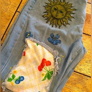 Women’s jeans re imaged w/ floral pattern